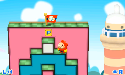 Screenshot of Pullblox showing only the 3DS top screen. The player character is standing on the edge of a block below a flag. The flag is reachable by jumping onto a block next to the character and then jumping again onto the block the flag is on.
